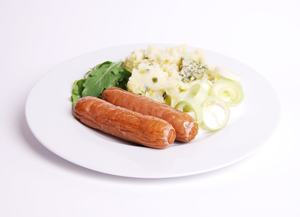 Sausages with mashed potato and salad garnish